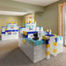 Two kids in forts made from the Large Set of EverBlock Modular Building Blocks
