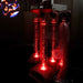 Vecta Delight Mobile Sensory Station in the dark with pattern on wall and bubble tube in red