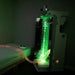Vecta Delight Mobile Sensory Station next to bed in green