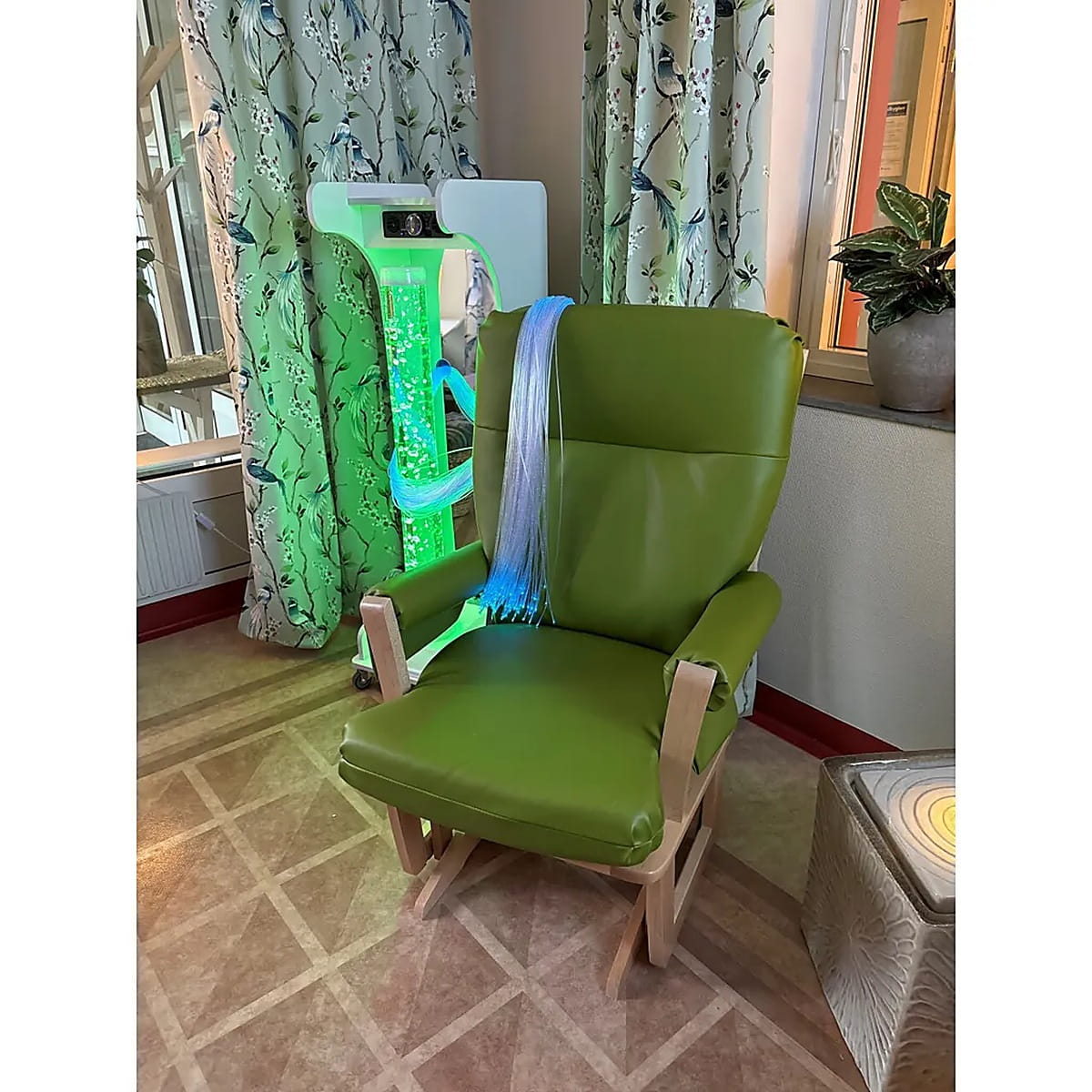 Vecta Jr Mobile Sensory Cart next to a chair