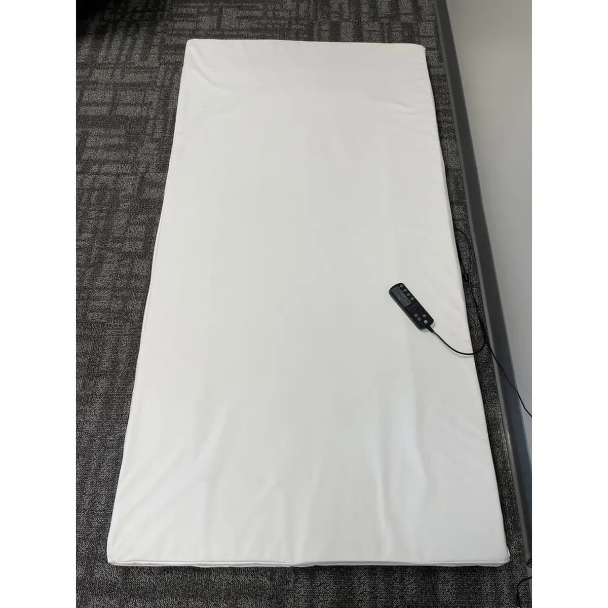 Vibrating Sensory Mat with controller on it
