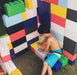 a_child_playing_with_giant_legos