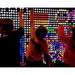 three kids playing on the LiteZilla Interactive Light Wall making designs